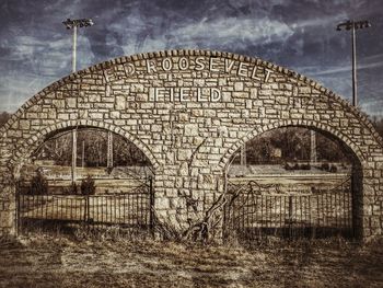 Built structure against cloudy sky