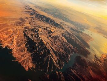 Aerial view of landscape during sunset