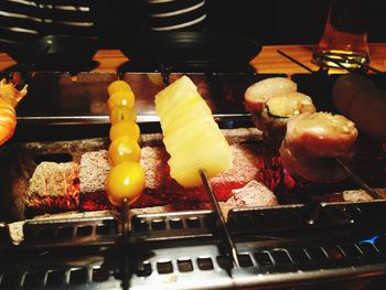 Close-up of meat on barbecue grill