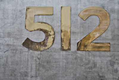 Close-up of number on wall