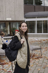 Smiling woman looking at camera