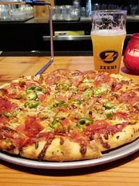 High angle view of pizza served on table