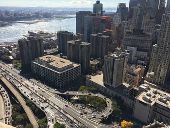 High angle view of road amidst buildings in city