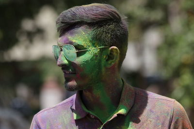 Close-up of man filth with powder paint