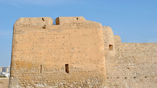 Low angle view of historical building against sky