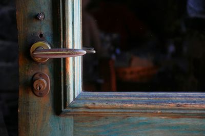 Close-up of handle and keyhole of door