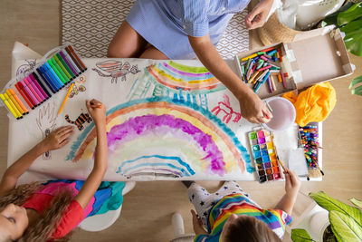 High angle view of people working at home