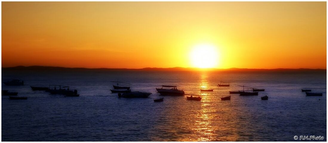 sunset, water, sea, orange color, sun, nautical vessel, transportation, scenics, boat, tranquil scene, beauty in nature, tranquility, mode of transport, silhouette, waterfront, idyllic, nature, sky, horizon over water, transfer print