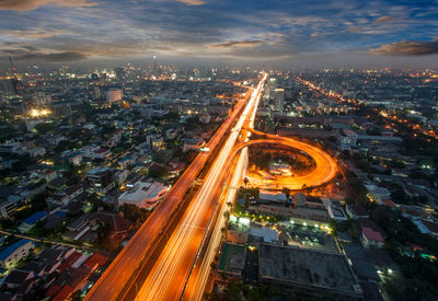 High angle view of light trails on road in city