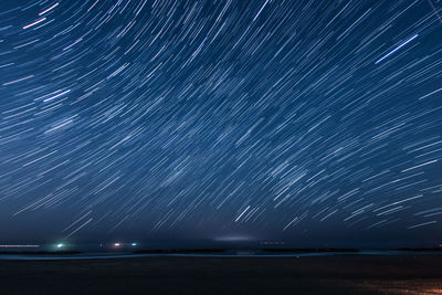 Scenic view of sea against sky at night