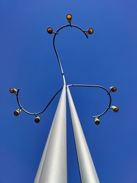 Low angle view of street light against clear sky