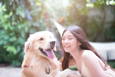 Portrait of woman with dog