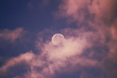 Low angle view of moon against sky at night