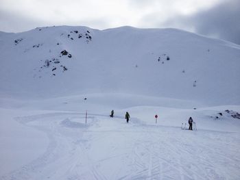 Scenic view of snow covered mountains