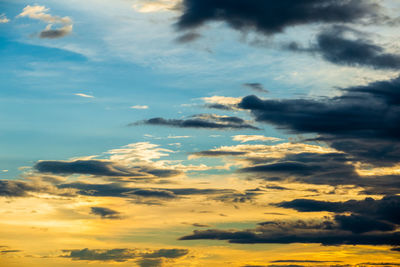 Low angle view of dramatic sky during sunset