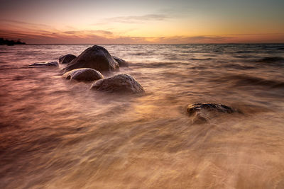 Scenic view of sea during sunset