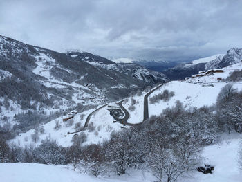 Scenic view of mountains against sky during winter