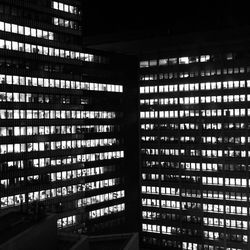 Illuminated buildings in city at night