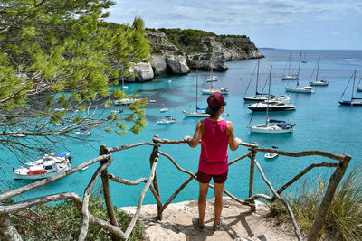 Rear view of woman looking at sea