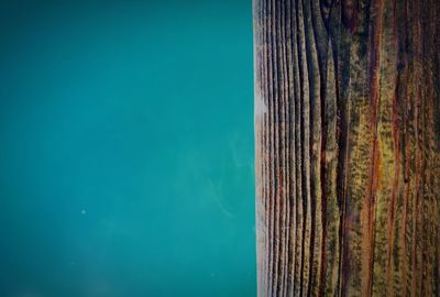Close-up of wood against sea
