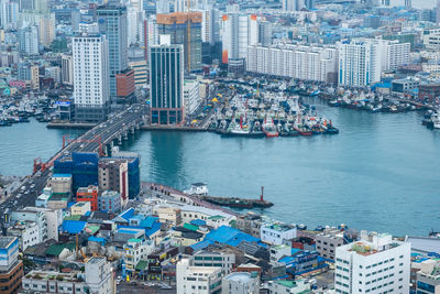 High angle view of city buildings at waterfront