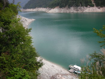 High angle view of lake amidst trees in forest