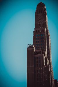 Low angle view of building against blue sky
