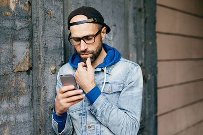 Young man using mobile phone