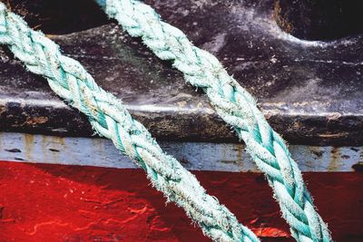 High angle view of turquoise ropes on boat