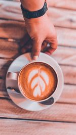 Close-up of coffee cup on table