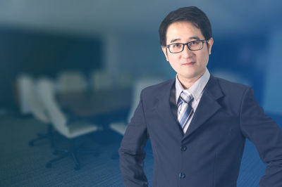 Portrait of man wearing eyeglasses