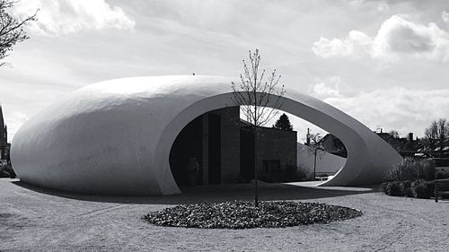 Built structure against cloudy sky