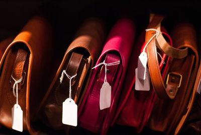 Close-up of purses for sale in shop