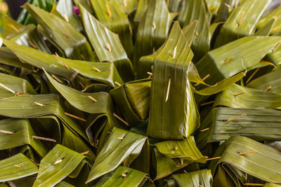 Traditional thai desserts packed with banana leaves.