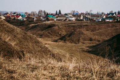 Panoramic shot of agricultural field against sky