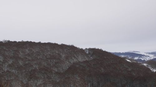 Scenic view of mountains against clear sky