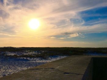 Scenic view of sea at sunset