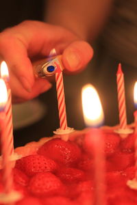 Close-up of hand holding ice cream