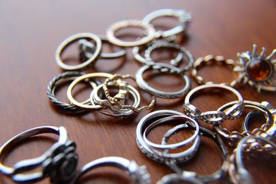 Close-up of rings on wooden table