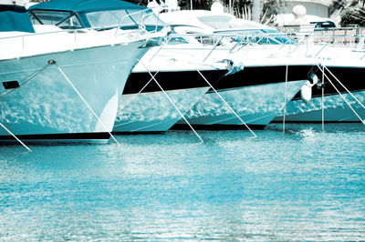 Boats moored in swimming pool