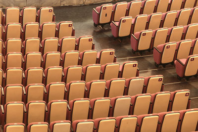 High angle view of empty chairs in auditorium
