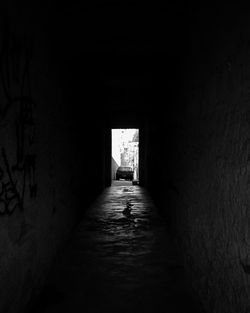 Man walking in tunnel