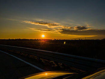 Road against sky during sunset