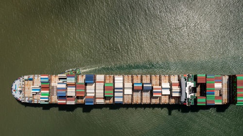 Aerial view container cargo ship import export business commercial trade logistic and transportation 