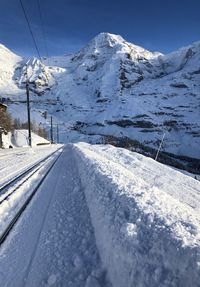 Snow covered mountain against sky