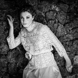 Portrait of woman standing outdoors