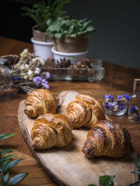 Close-up of croissants on cutting board
