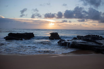 Scenic view of sea against sky during sunset