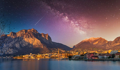 Scenic view of mountains against sky at night