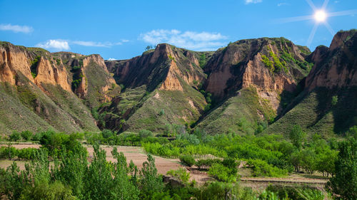 Panoramic view of landscape and mountains against sky